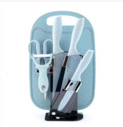 CUCHILLOS EN ACERO CON BASE Y TABLA X7